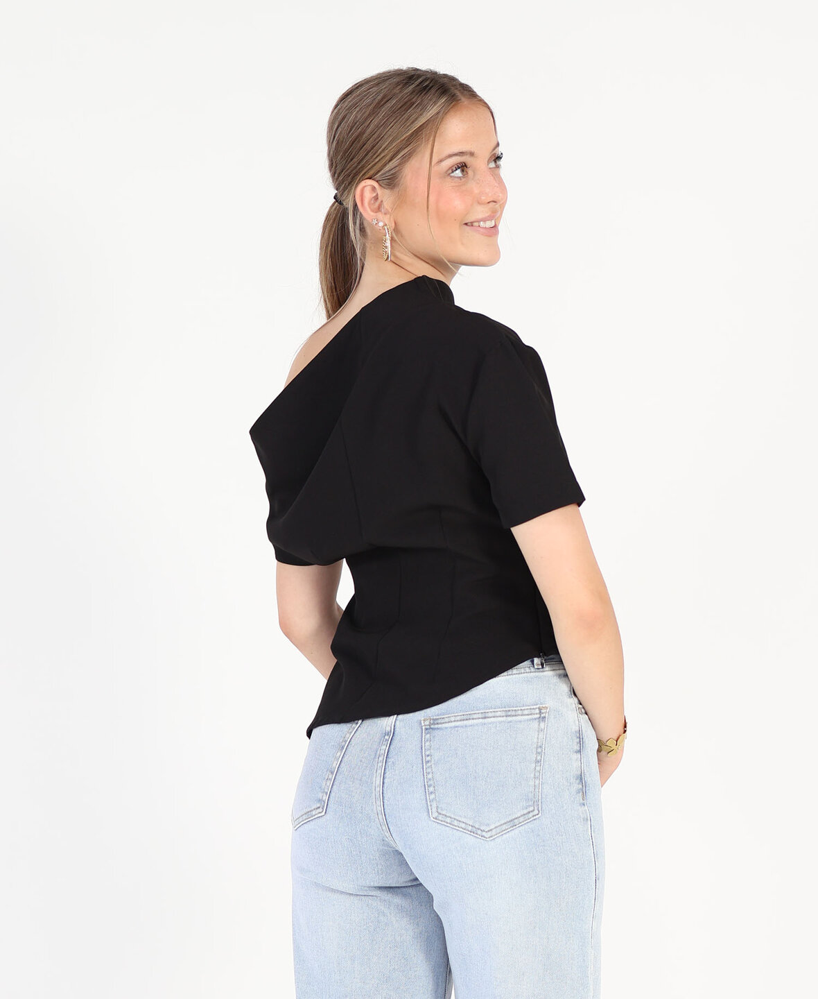 Asymmetric Top Black